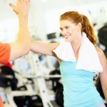 High Five Happy Women at the Gym