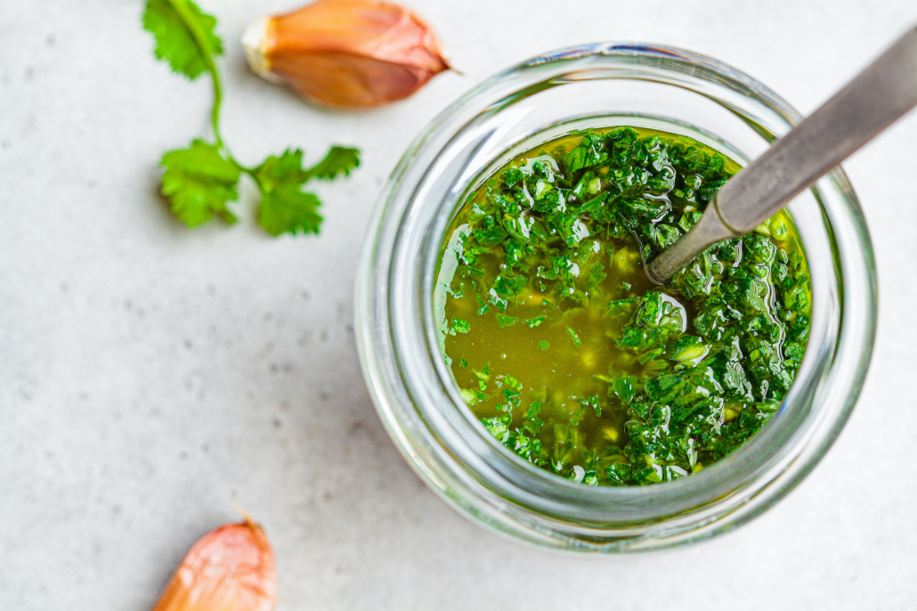 bow of chimichurri Vinaigrette with onions and parsley