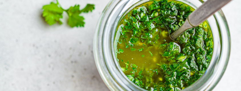 bow of chimichurri Vinaigrette with onions and parsley