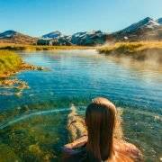 woman sitting in a Hot Spring Canada