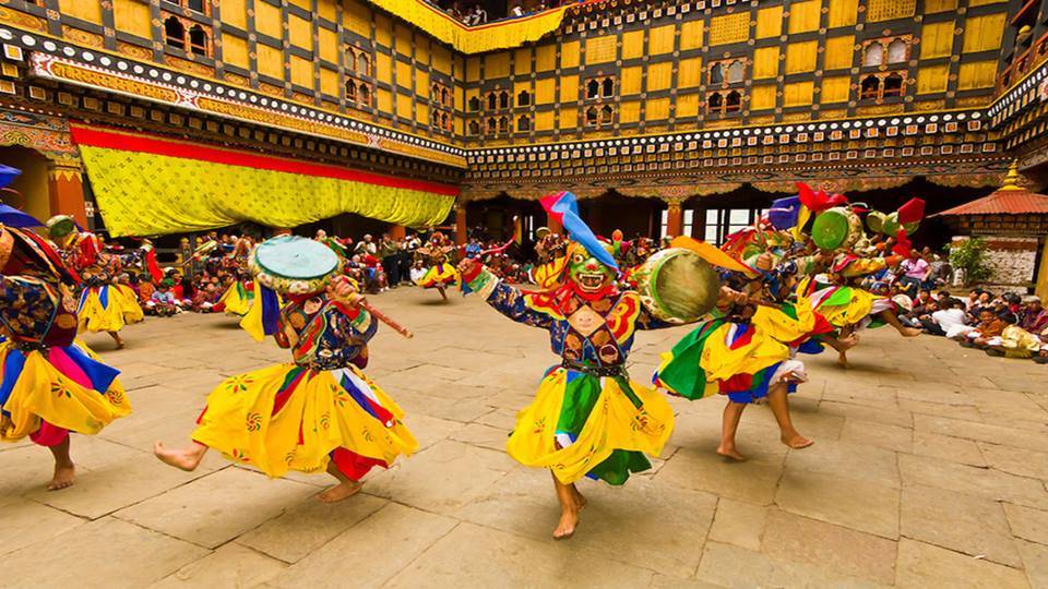 Dancers at the Paro Tsechu Festival or Spring Festival experienced on Mountain Trek Adventure Trek