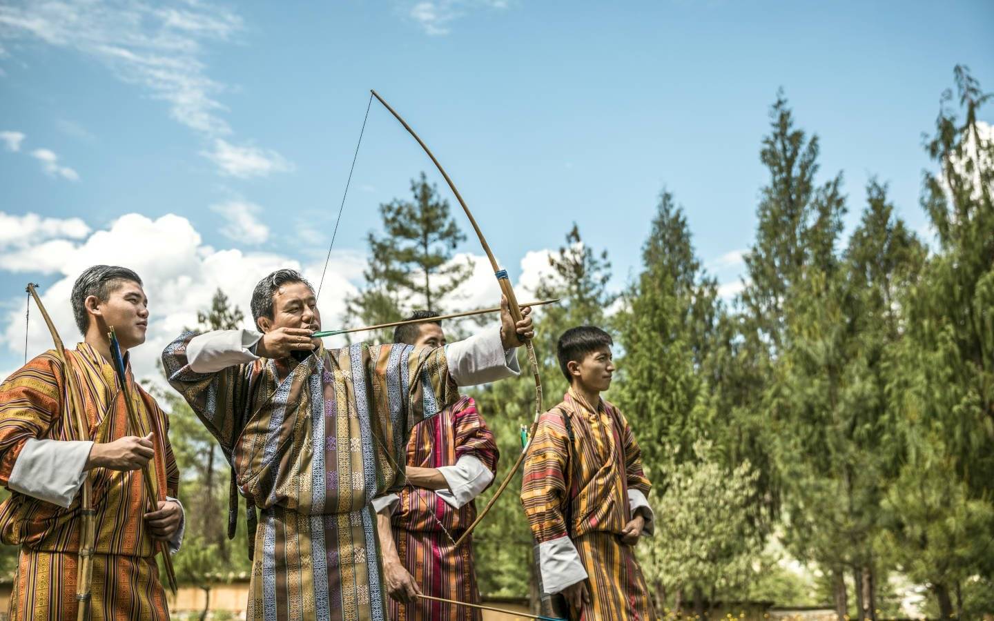 Archers in Paro. Archery is the national Sport of Bhutan and is seen on Mountain Trek Adventure Trek