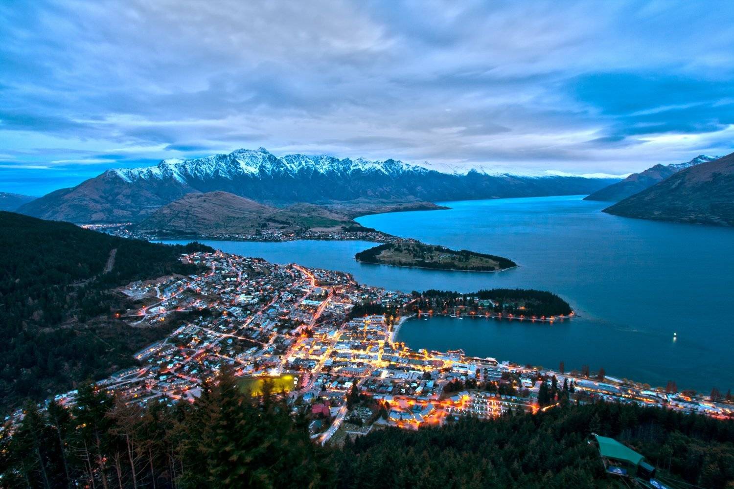 Aerial view of Queenstown New Zealand with lake and mountains in background