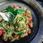 Chef Simon Vine makes rutabaga spaghetti with tempeh-almond ‘meatballs’ and a tomato-cashew rosee sauce at Mountain Trek